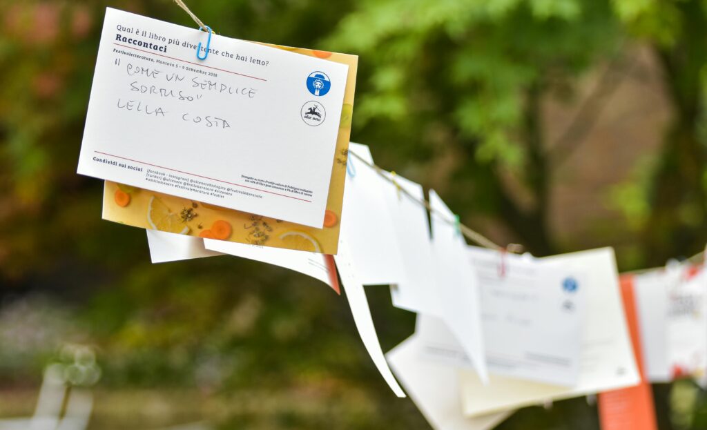 Picture of mail that is pinned to a clothesline